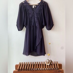 Purple lace layered babydoll dress with 3/4 sleeves. Size S